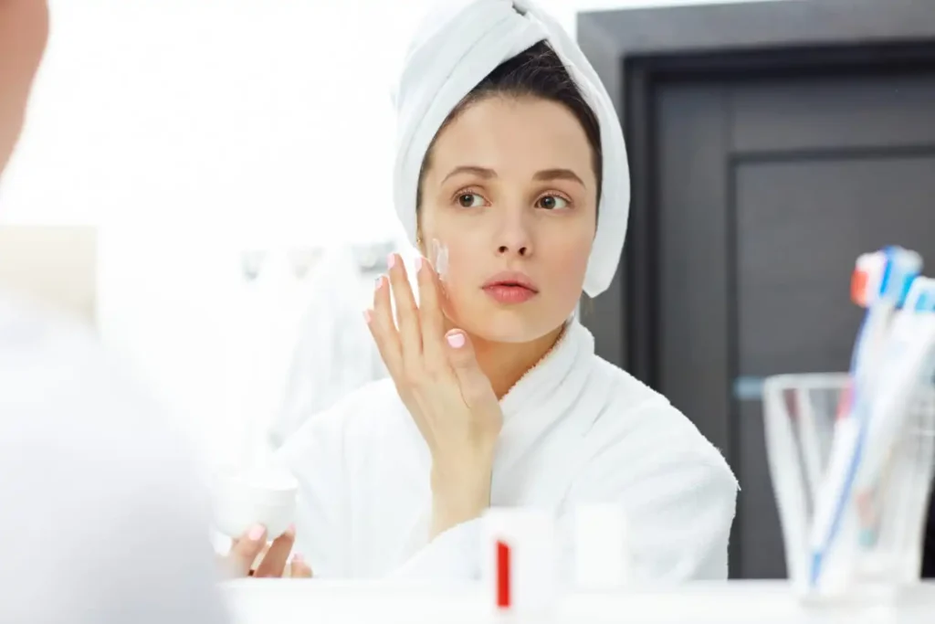 Skincare routine featuring niacinamide serum applied to the face to help improve skin texture, reduce blemishes, and support healthy skin.